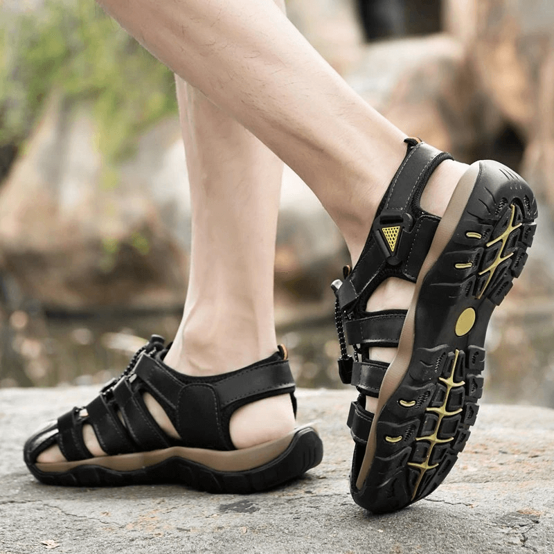 Men's genuine leather lightweight sandals with rubber outsole, ideal for outdoor and beach activities, showcasing secure fit and comfort.